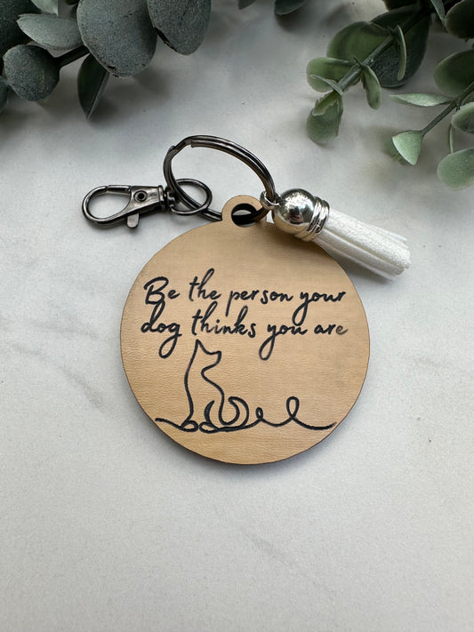 Be the Person Your Dog Thinks You Are Keychain